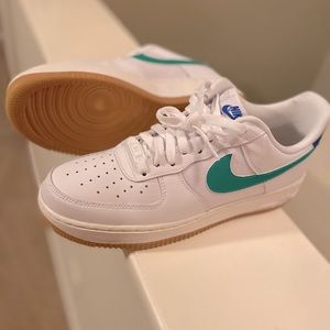 White Nike Air Force’s with Green Check Logo
